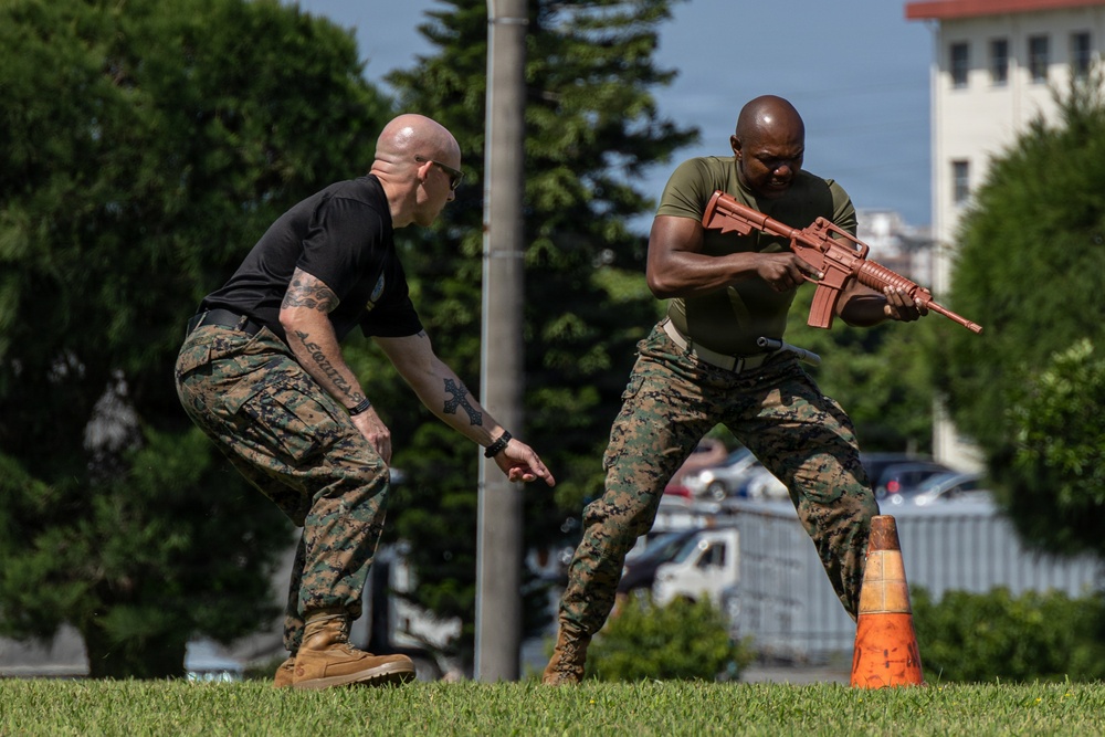 Marines and Japanese Security Guards conduct OC Spray training at Camp Foster