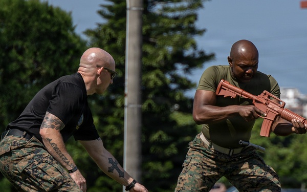 Marines and Japanese Security Guards conduct OC Spray training at Camp Foster