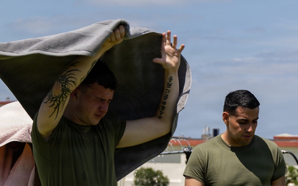Marines and Japanese Security Guards conduct OC Spray training at Camp Foster