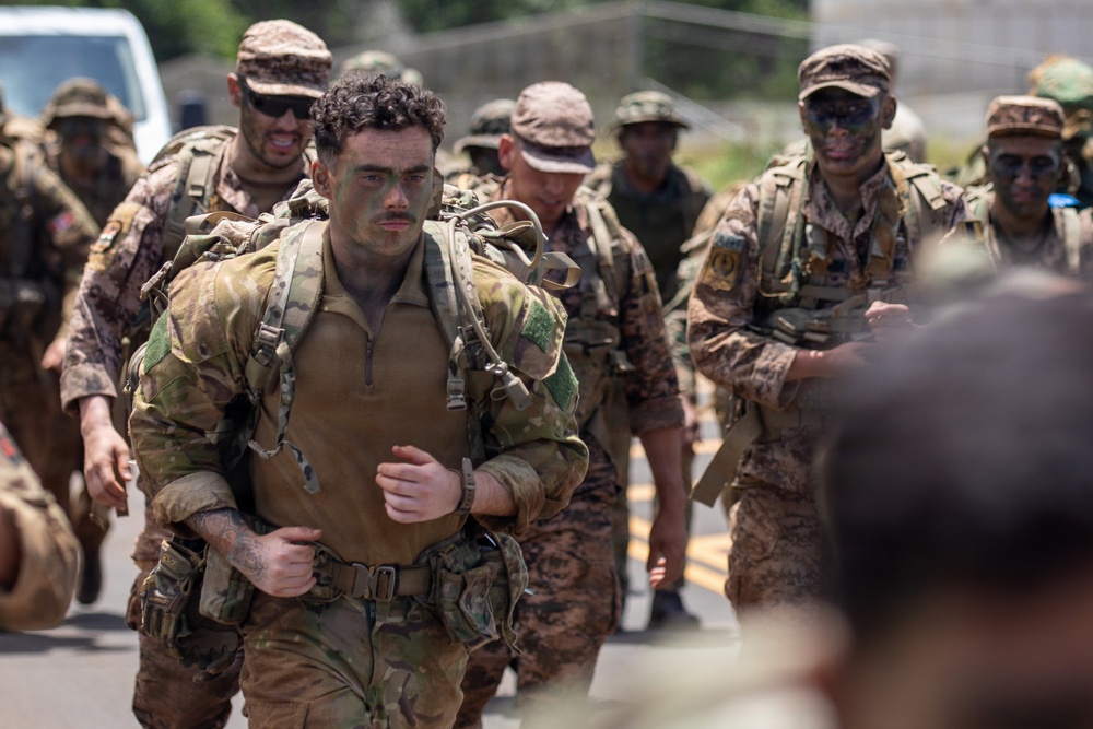 Multinational Soldiers compete in Ruck March for Pacific Land Forces Team Readiness Challenge