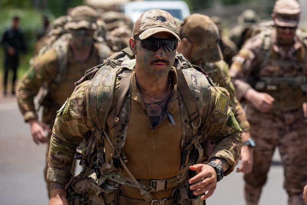 Multinational Soldiers compete in Ruck March for Pacific Land Forces Team Readiness Challenge