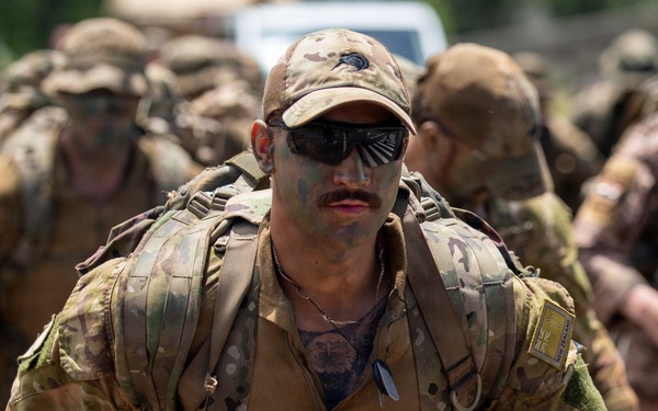 Multinational Soldiers compete in Ruck March for Pacific Land Forces Team Readiness Challenge