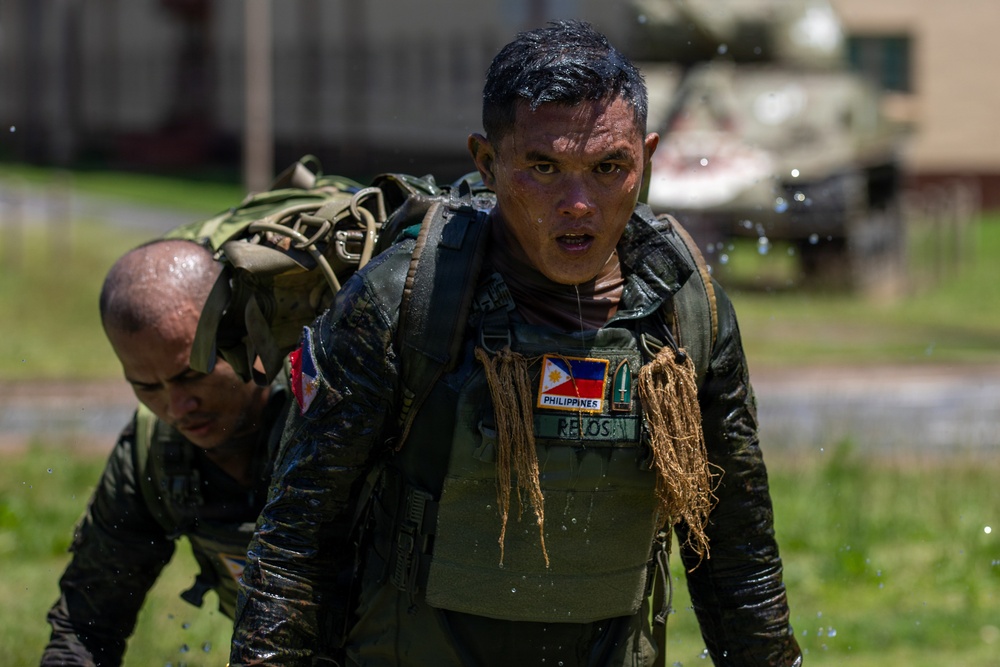 Multinational Soldiers compete in Ruck March for Pacific Land Forces Team Readiness Challenge