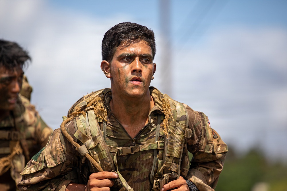 Multinational Soldiers compete in Ruck March for Pacific Land Forces Team Readiness Challenge