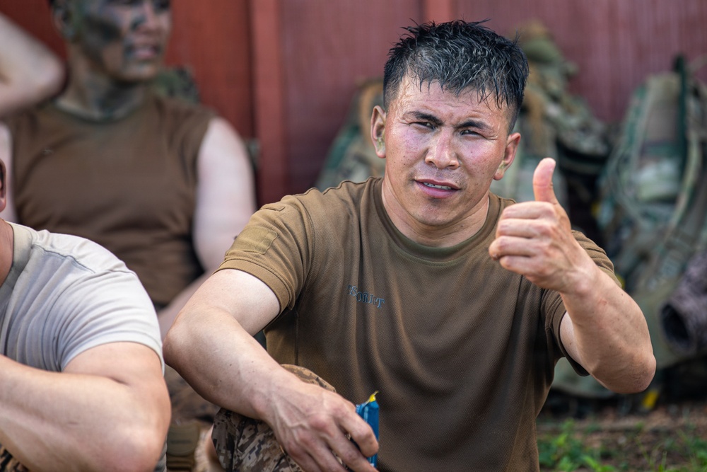 Multinational Soldiers compete in Ruck March for Pacific Land Forces Team Readiness Challenge