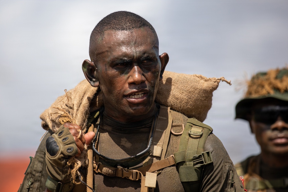 Multinational Soldiers compete in Ruck March for Pacific Land Forces Team Readiness Challenge