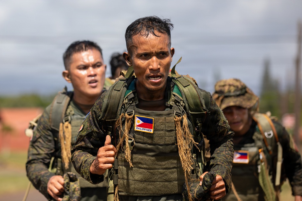 Multinational Soldiers compete in Ruck March for Pacific Land Forces Team Readiness Challenge