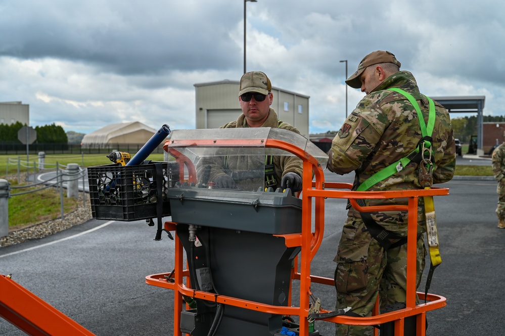 104th Fighter Wing Hangs Banners Honoring Fallen Barnestormers