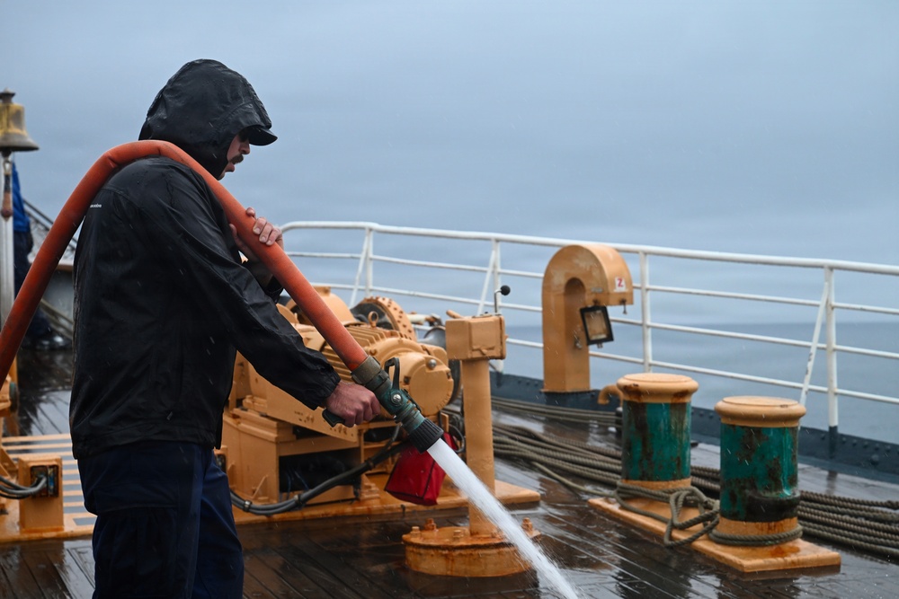 Coast Guard Cutter Barque Eagle's crew conducts deck maintenance