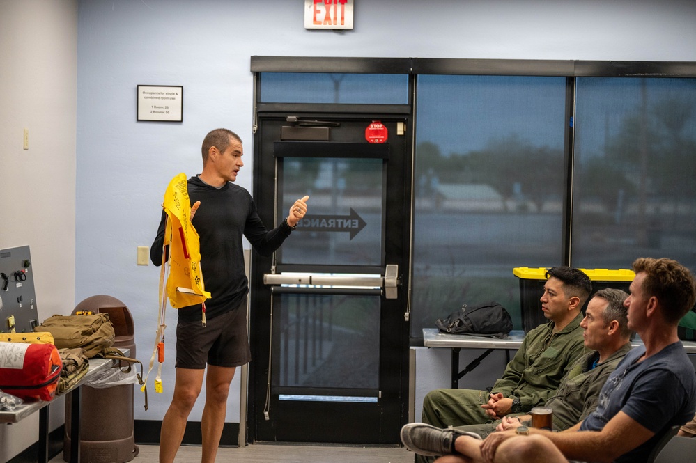 Airmen Participate in Operations Water Survival Training for Aircrew