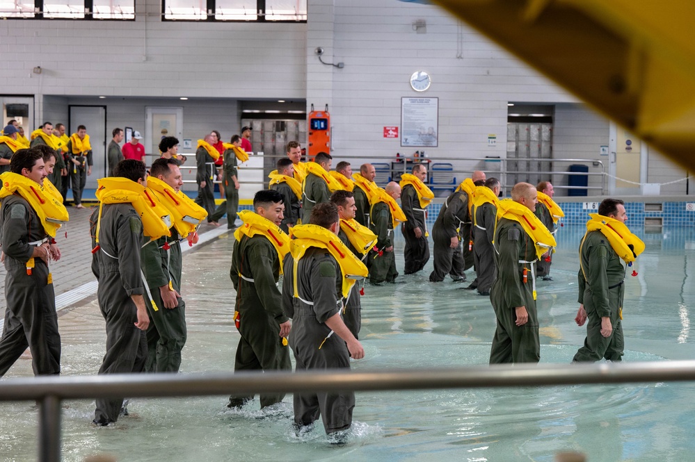 Airmen Participate in Operations Water Survival Training for Aircrew