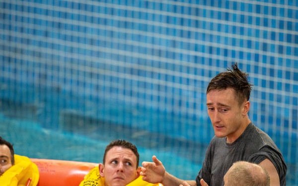 Airmen Participate in Operations Water Survival Training for Aircrew