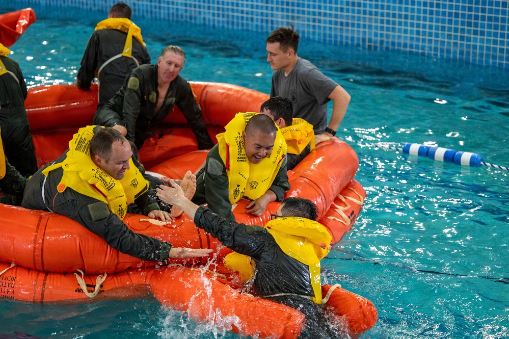 Airmen Participate in Operations Water Survival Training for Aircrew