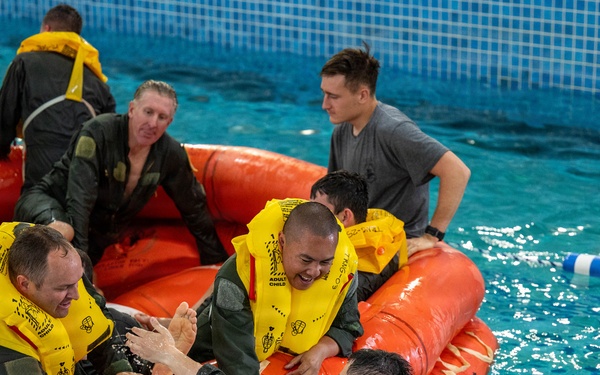 Airmen Participate in Operations Water Survival Training for Aircrew