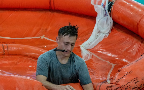 Airmen Participate in Operations Water Survival Training for Aircrew