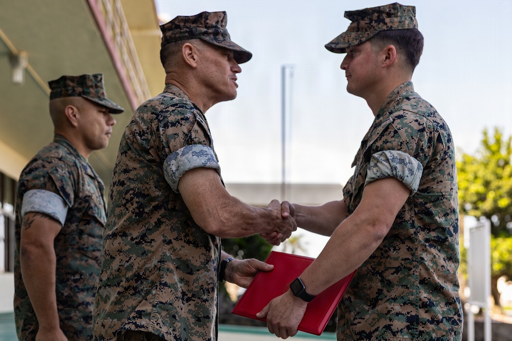 MCIPAC Officials award Marines, Sailors and members of the Okinawa Defense Bureau
