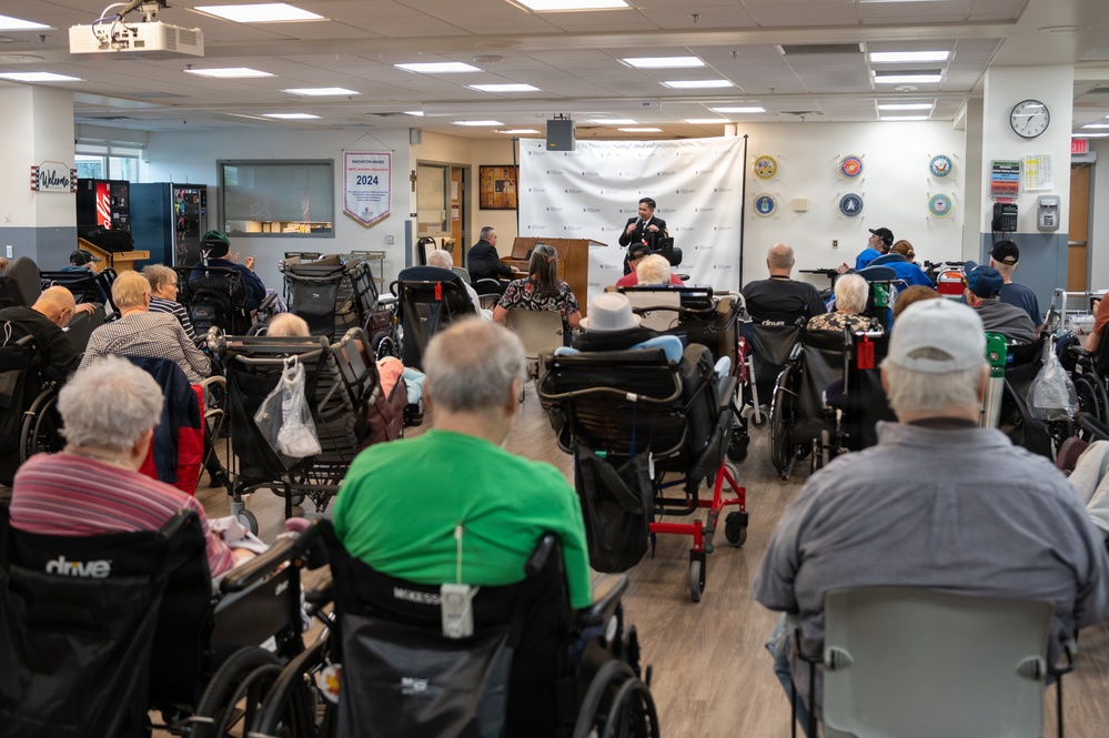 Members of the U.S. Navy Band Cruisers perform at veterans center