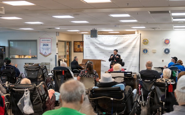 Members of the U.S. Navy Band Cruisers perform at veterans center