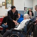 Members of the U.S. Navy Band Cruisers perform at veterans center
