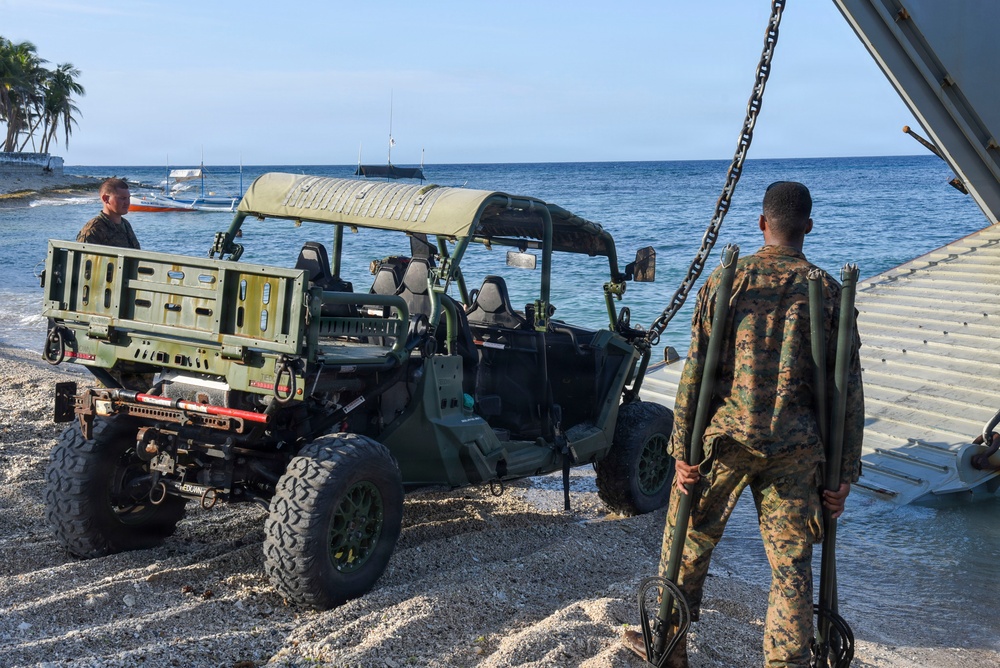 Balikatan 2026: U.S. Marines, Soldiers load HIMARS and NMESIS on LCU