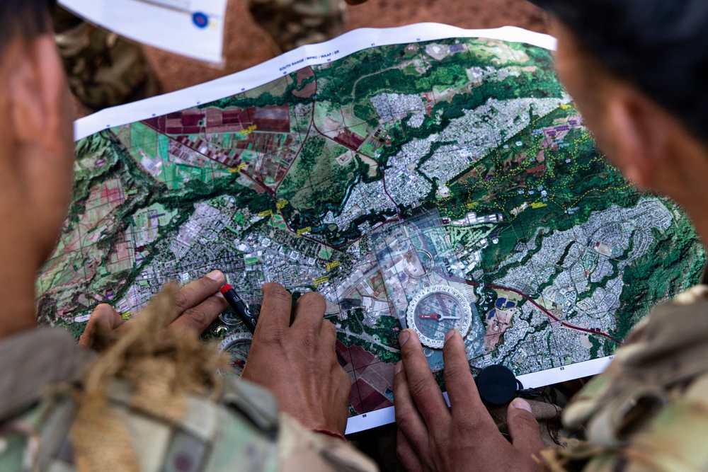 Multinational Soldiers Conduct Urban Land Navigation During Pacific Land Forces Team Readiness Challenge