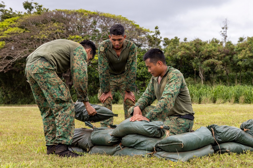 Multinational Soldiers Conduct Urban Land Navigation During Pacific Land Forces Team Readiness Challenge
