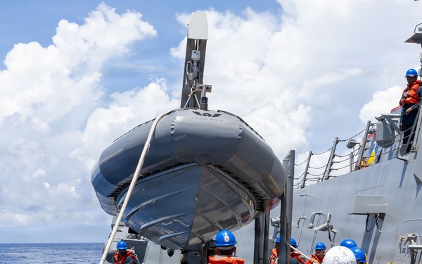 USS Mustin conducts boat operations
