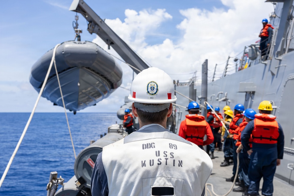 USS Mustin conducts boat operations