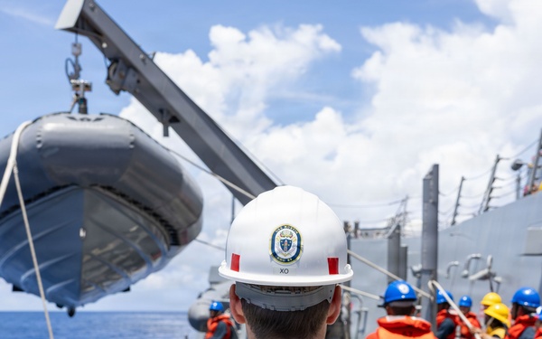 USS Mustin conducts boat operations