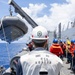 USS Mustin conducts boat operations