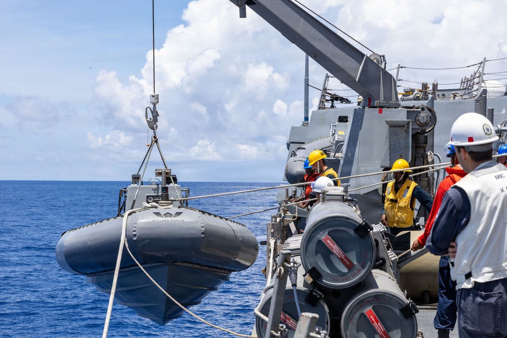 USS Mustin conducts boat operations