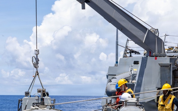 USS Mustin conducts boat operations