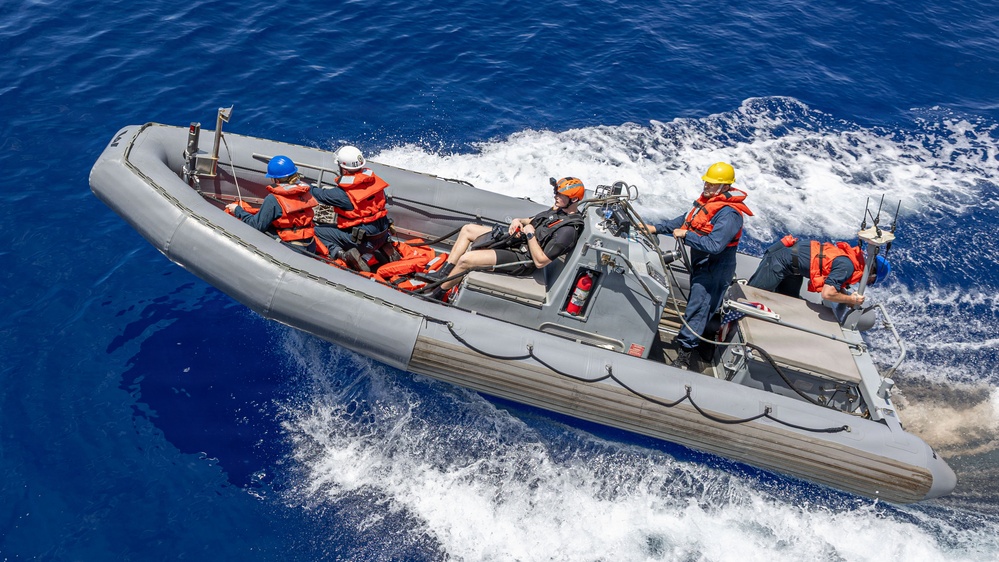 USS Mustin conducts boat operations
