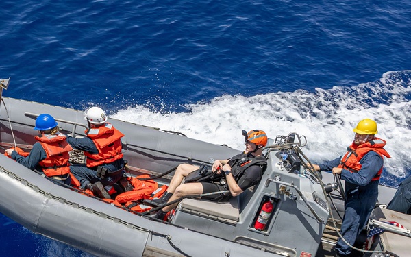 USS Mustin conducts boat operations