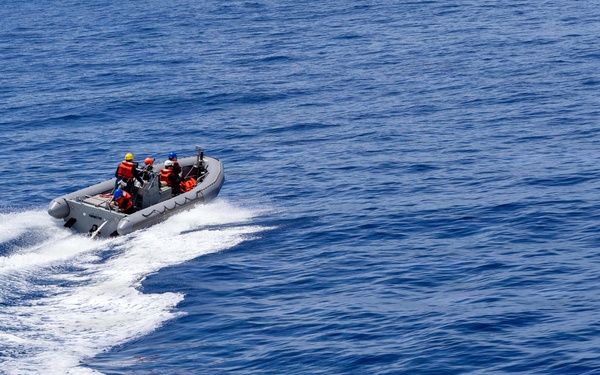 USS Mustin conducts boat operations