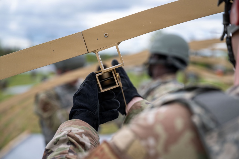 JBA Airmen strengthen expeditionary skills in Bivouac field exercise