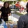 Cultural Heritage Presenter Engages Visitor at Marine Corps Community Services Outdoor Fair