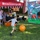 Young child plays Kick &amp; Score game at Marine Corps Semper Fit community event