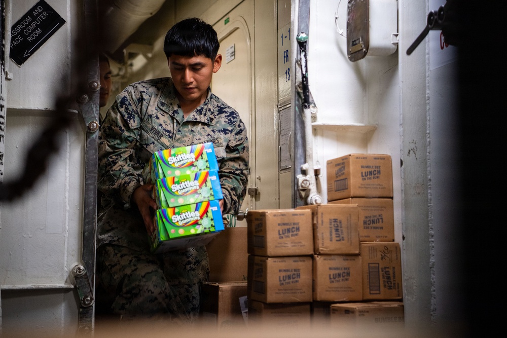 Sailors, Marines Replenish USS Boxer’s Ship’s Store