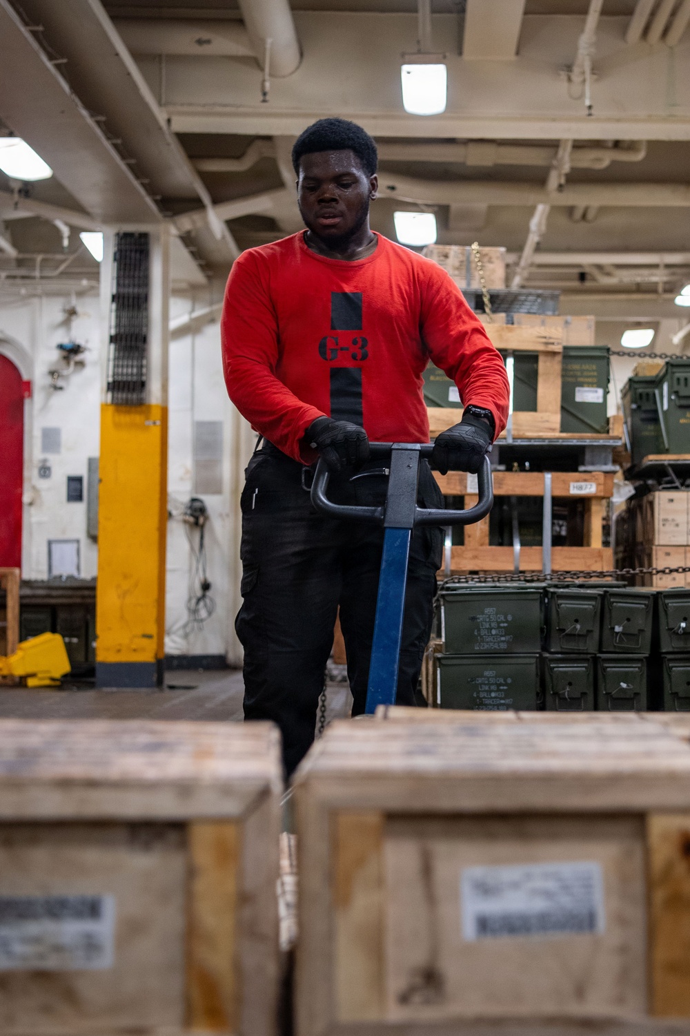 Boxer Sailors Store Ordnance