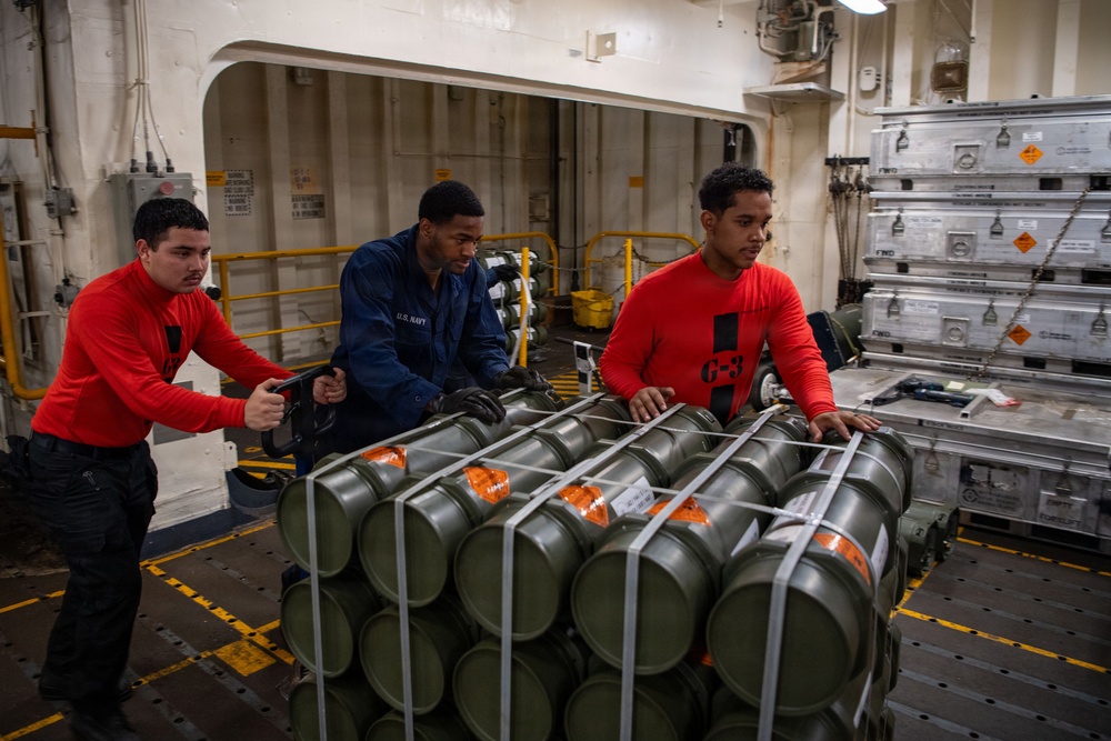 Boxer Sailors Store Ordnance