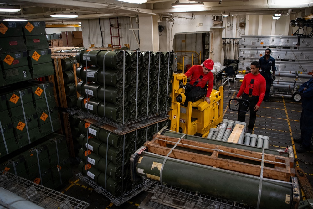 Boxer Sailors Store Ordnance