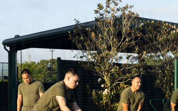 Marines attending 1st Sgts. Symposium Conduct physical training