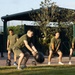 Marines attending 1st Sgts. Symposium Conduct physical training