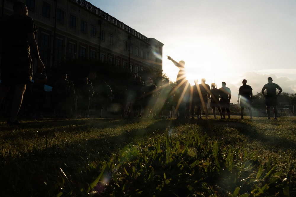 Marines attending 1st Sgts. Symposium Conduct physical training