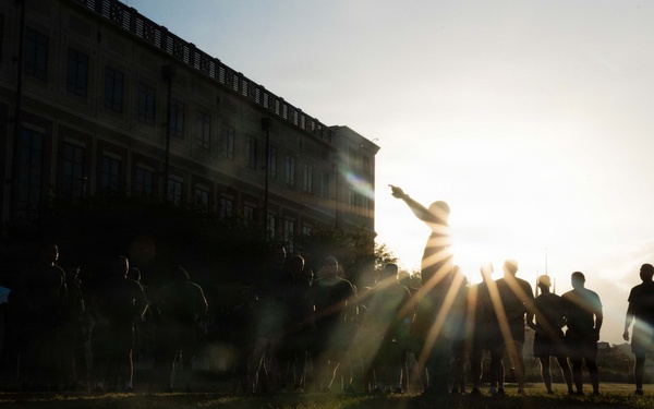 Marines attending 1st Sgts. Symposium Conduct physical training