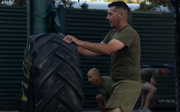 Marines attending 1st Sgts. Symposium Conduct physical training