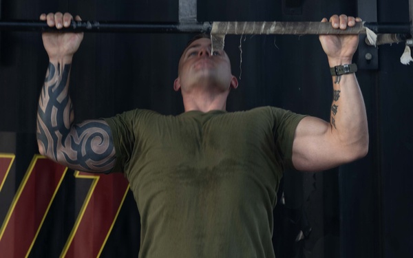Marines attending 1st Sgts. Symposium Conduct physical training