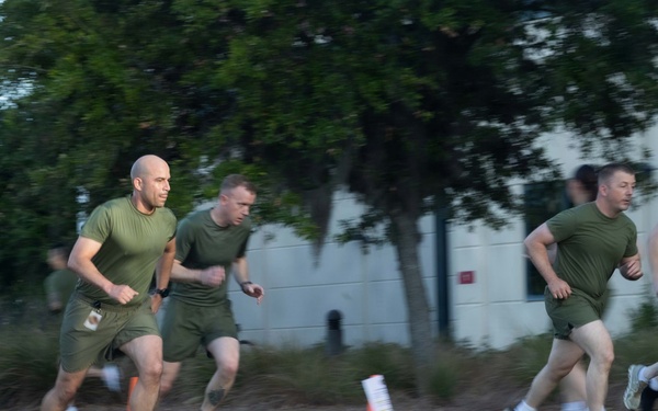 Marines attending 1st Sgts. Symposium Conduct physical training