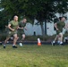 Marines attending 1st Sgts. Symposium Conduct physical training